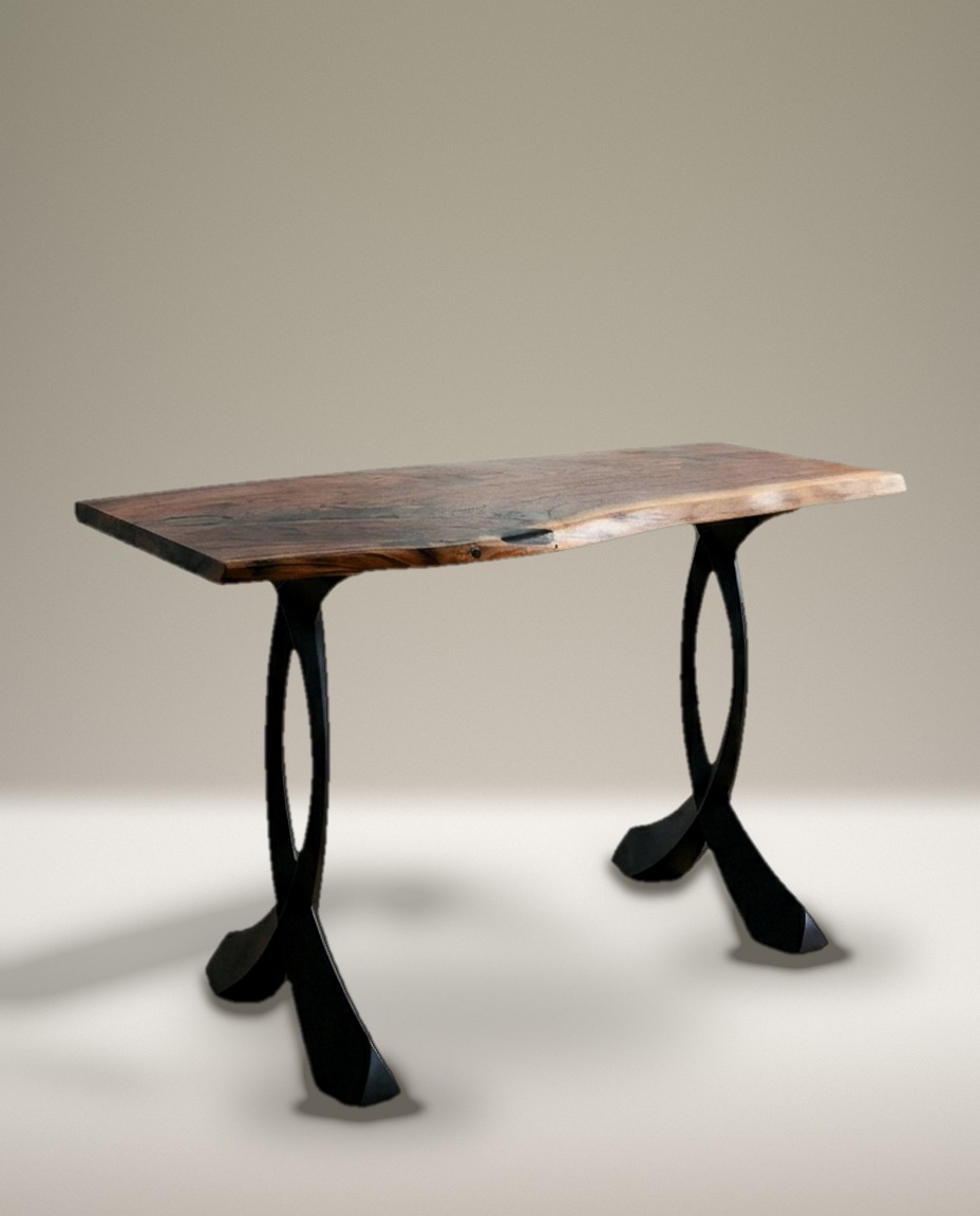 The Blackstone Console Table, live edge black walnut on Curva steel legs, photographed in the studio